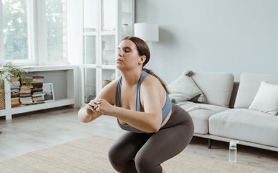 Bright and airy room prepared for a workout session.